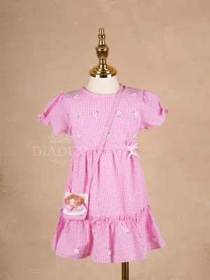 Pale Pink Cotton Frock Adorned with Floral and Small Checks Designs Girls