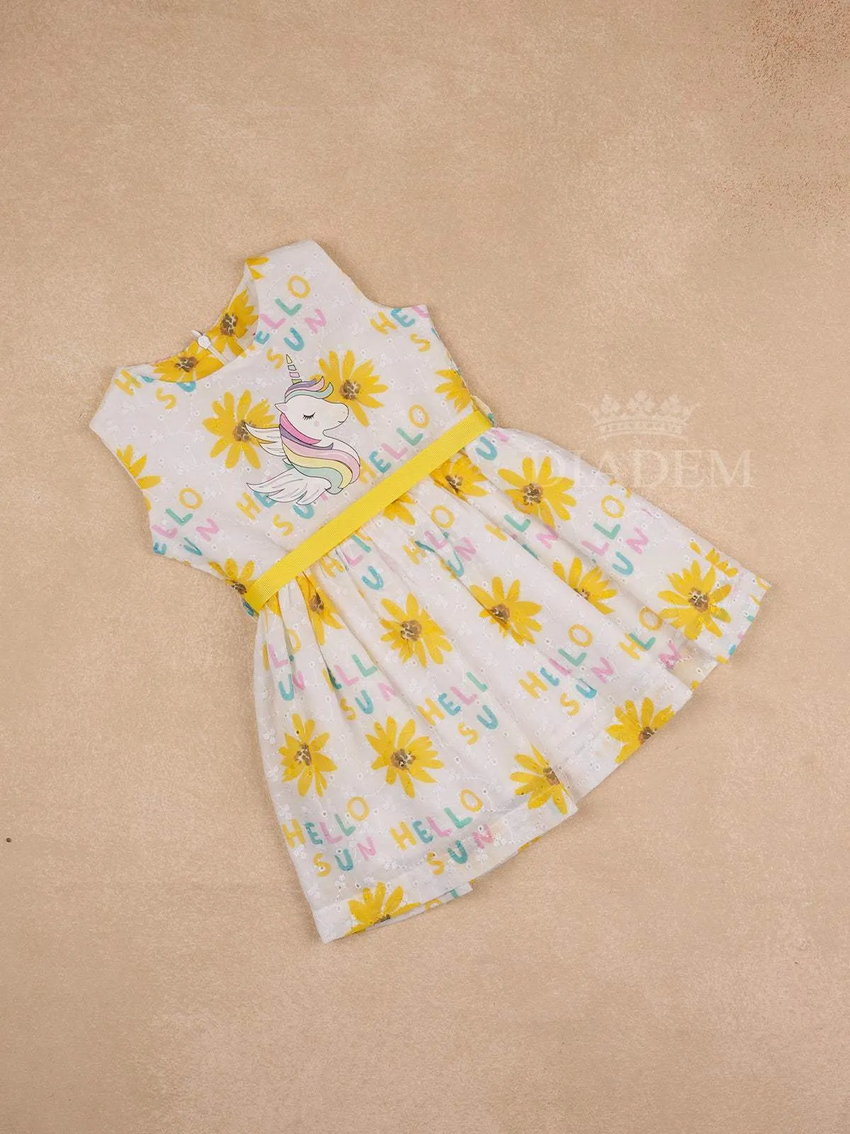 White Cotton Frock Adorned with Floral and Unicorn Designs for Girls