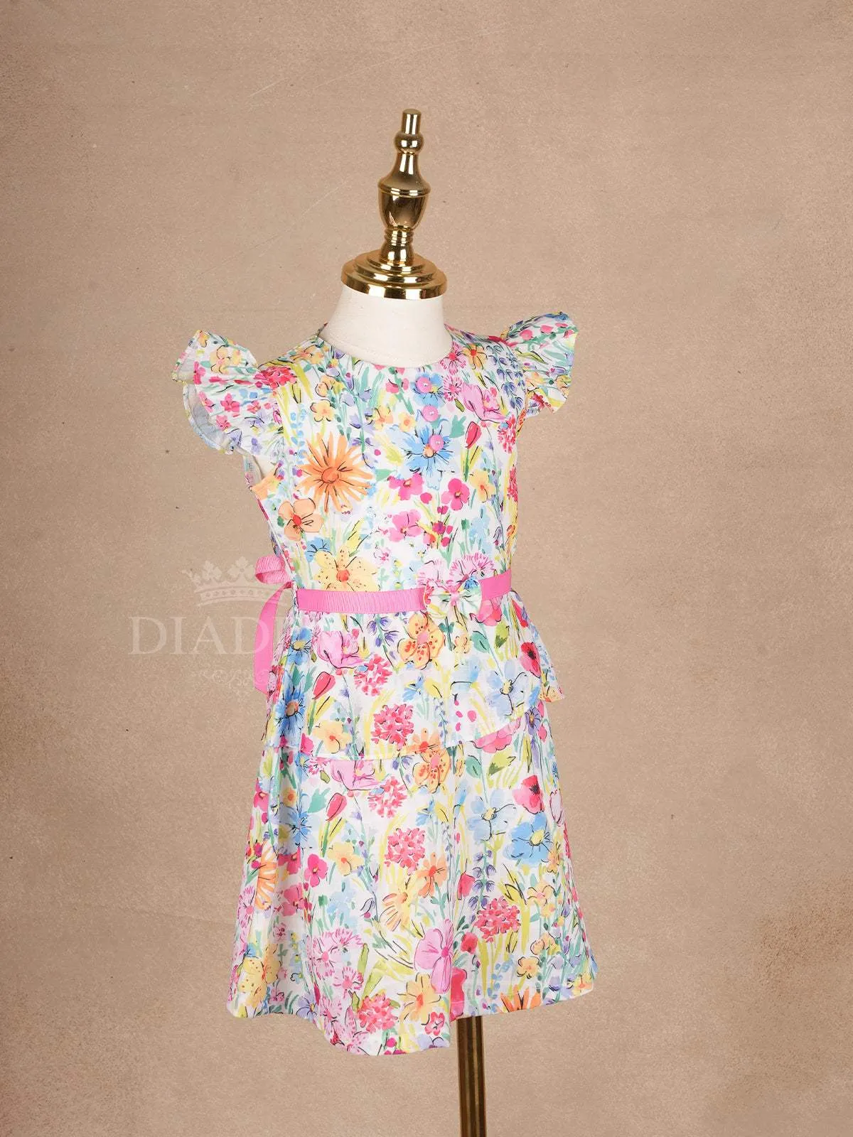 White Frock Adorned with Colorful Floral Designs and Cap Sleeve for Girls
