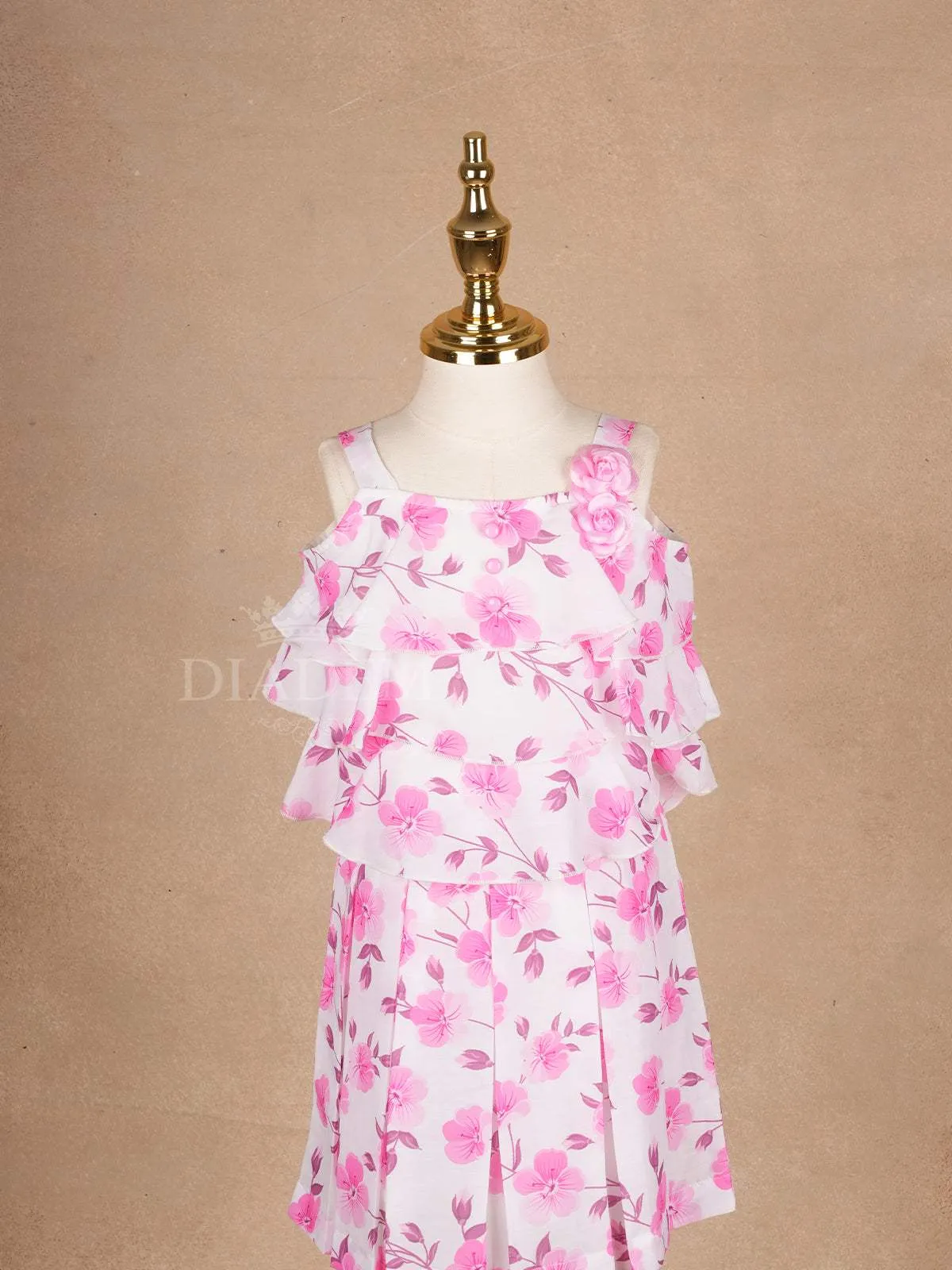 White Frock Adorned with Floral Designs and Sleeveless for Girls