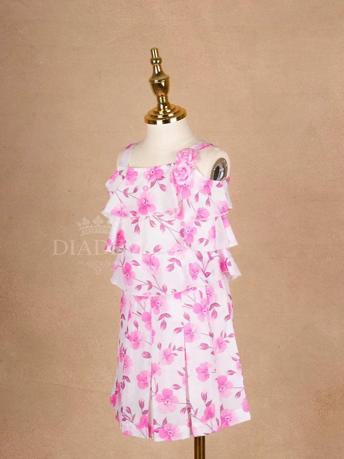 White Frock Adorned with Floral Designs and Sleeveless for Girls